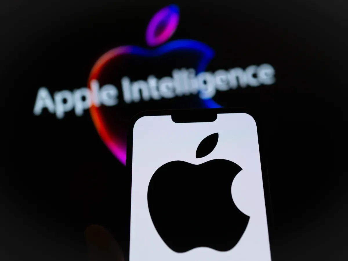 The Apple and Apple Intelligence AI logo are seen in this illustration photo taken on 13 June, 2024 in Warsaw, Poland. 