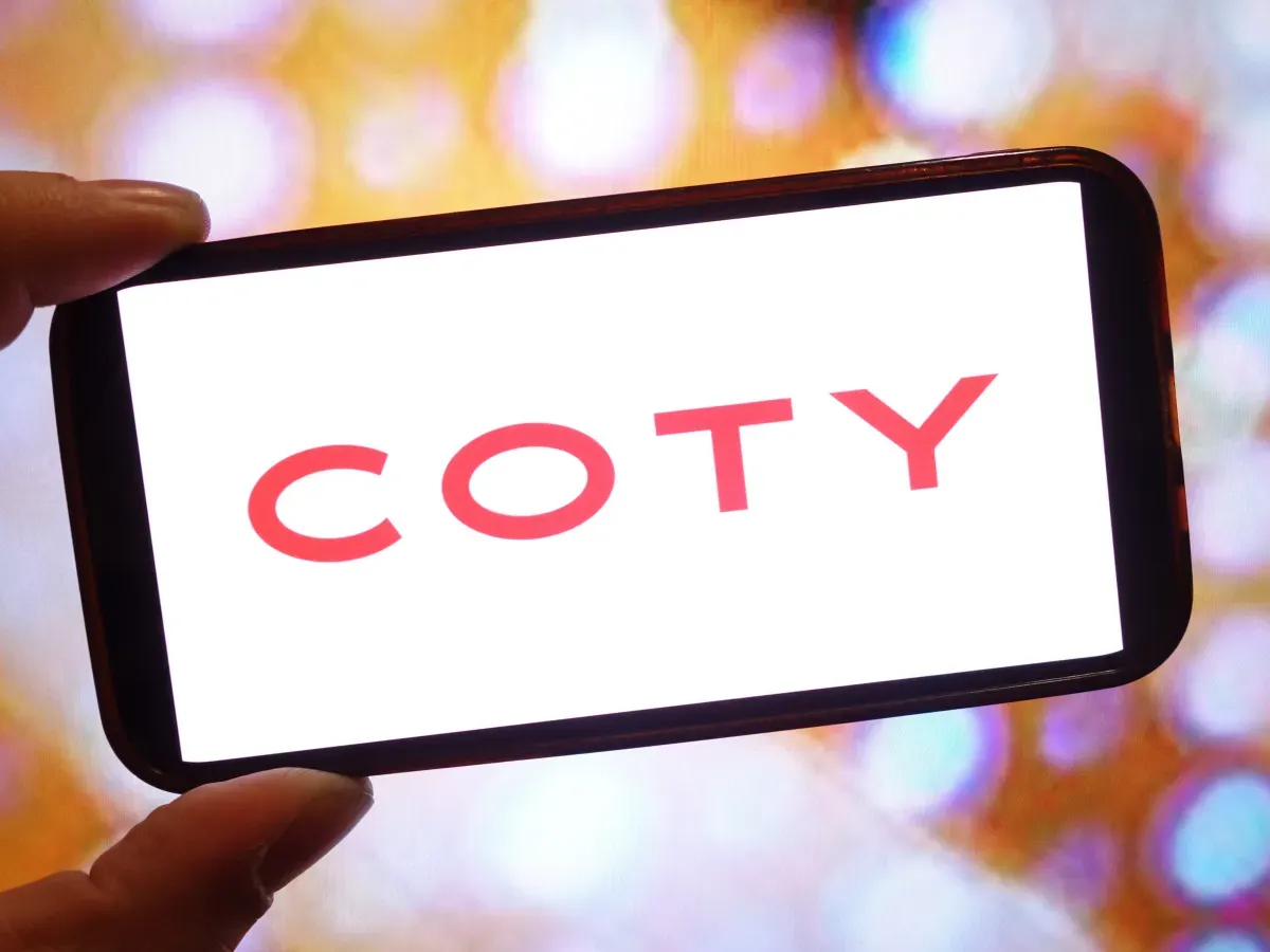 In this photo illustration, the Coty Inc company logo is seen displayed on a smartphone screen. (Photo Illustration by Piotr Swat/SOPA Images/LightRocket via Getty Images)