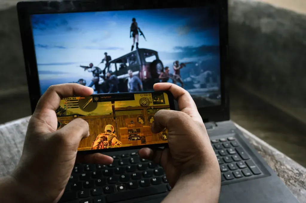 A boy plays PUBG at his home in Tehatta, Nadia, West Bengal, India.