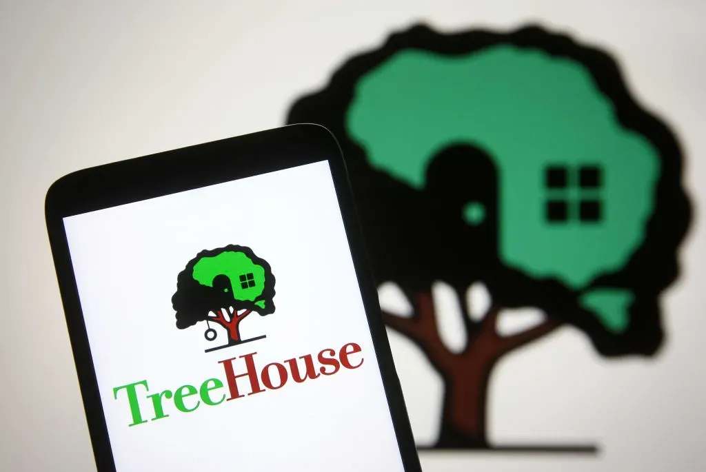 In this photo illustration a TreeHouse Foods logo is seen on a smartphone screen.