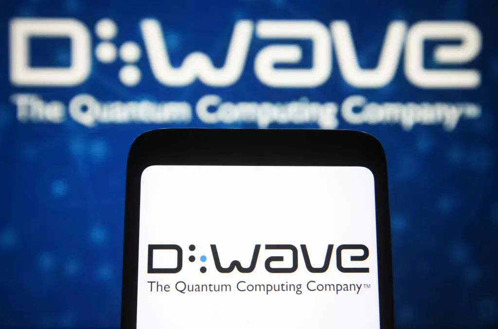 In this photo illustration, D-Wave Systems Inc. logo of a Canadian quantum computing company is seen on a smartphone screen.