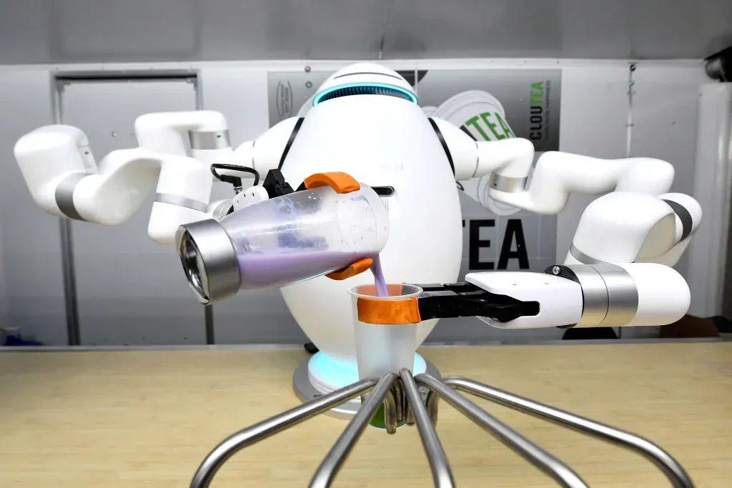  ADAM the bubble tea robot by Richtech Robotics prepares tea at the 2023 Bar & Restaurant Expo.