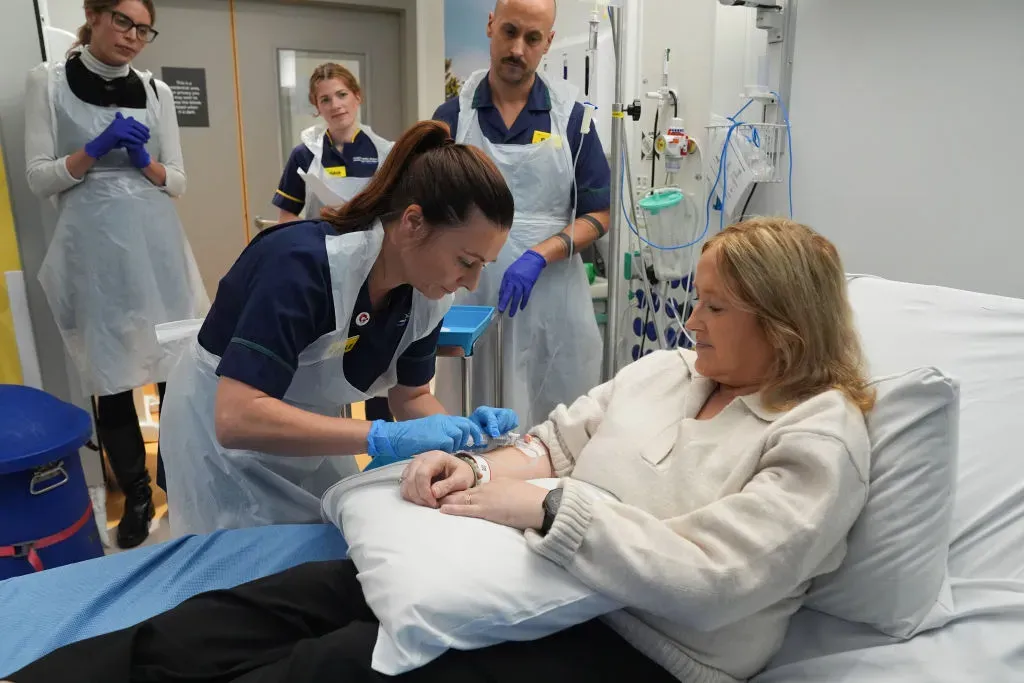 Senior Clinical Practice Facilitator Nicole Prescott administering breakthrough treatment to patient Katie Tinkler for lupus at University College London Hospital in London.