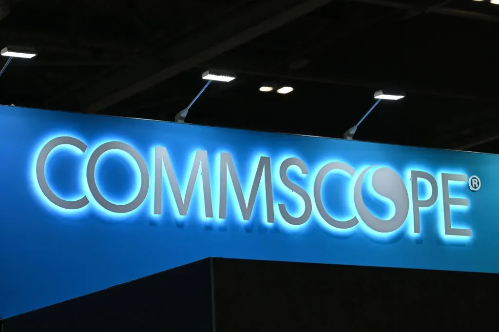 The company logo for Commscope is displayed during the Tech Show at ExCel London on March 12, 2025 in London, England.