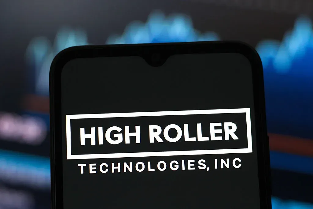 In this photo illustration, the High Roller Technologies logo is seen displayed on a smartphone screen.