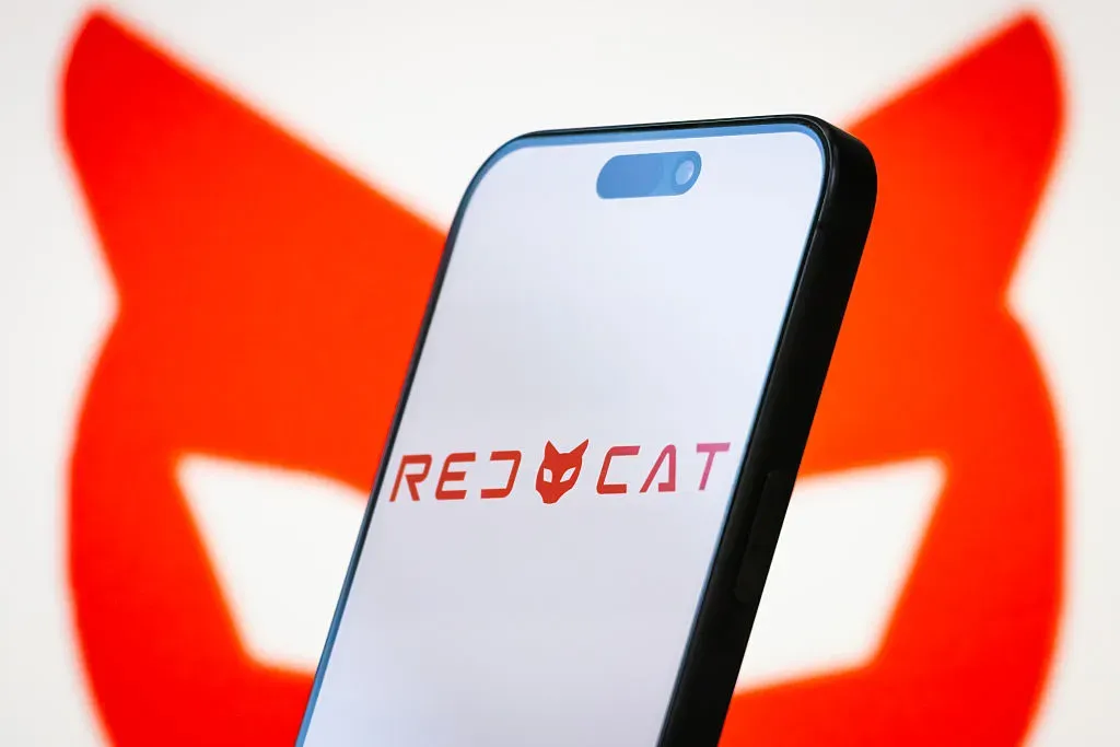 In this photo illustration, the logo of Red Cat Holdings, Inc. is displayed on a smartphone screen.