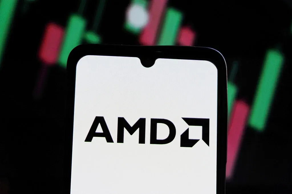  In this photo illustration, the AMD (Advanced Micro Devices) logo is seen displayed on a smartphone screen. 