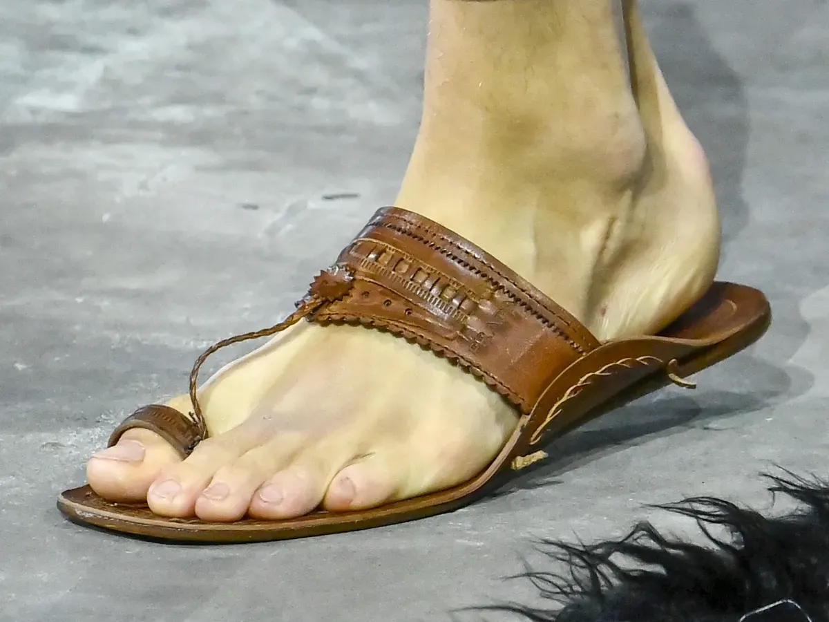 A model, shoe and bag detail, walks the runway at the Prada fashion show during the Milan Menswear Spring/Summer 2026 Fashion Week on June 22, 2025 in Milan, Italy. (Photo by Pietro D'Aprano/Getty Images)