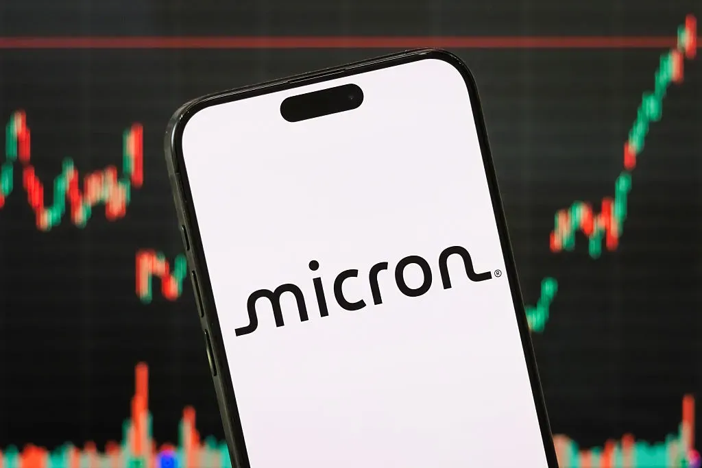 In this photo illustration, the logo of Micron Technology, Inc. is displayed on a smartphone screen.
