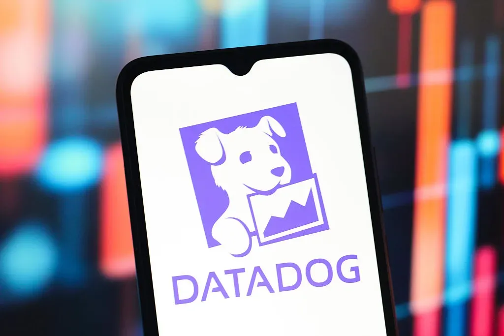 In this photo illustration, the Datadog (Data Dog) logo is seen displayed on a smartphone screen.