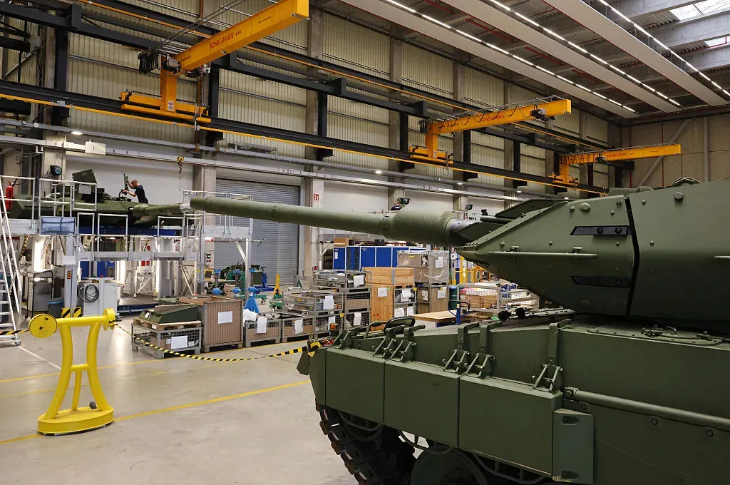 Workers assemble Leopard 2A7 main battle tanks at the KNDS heavy weapons factory.