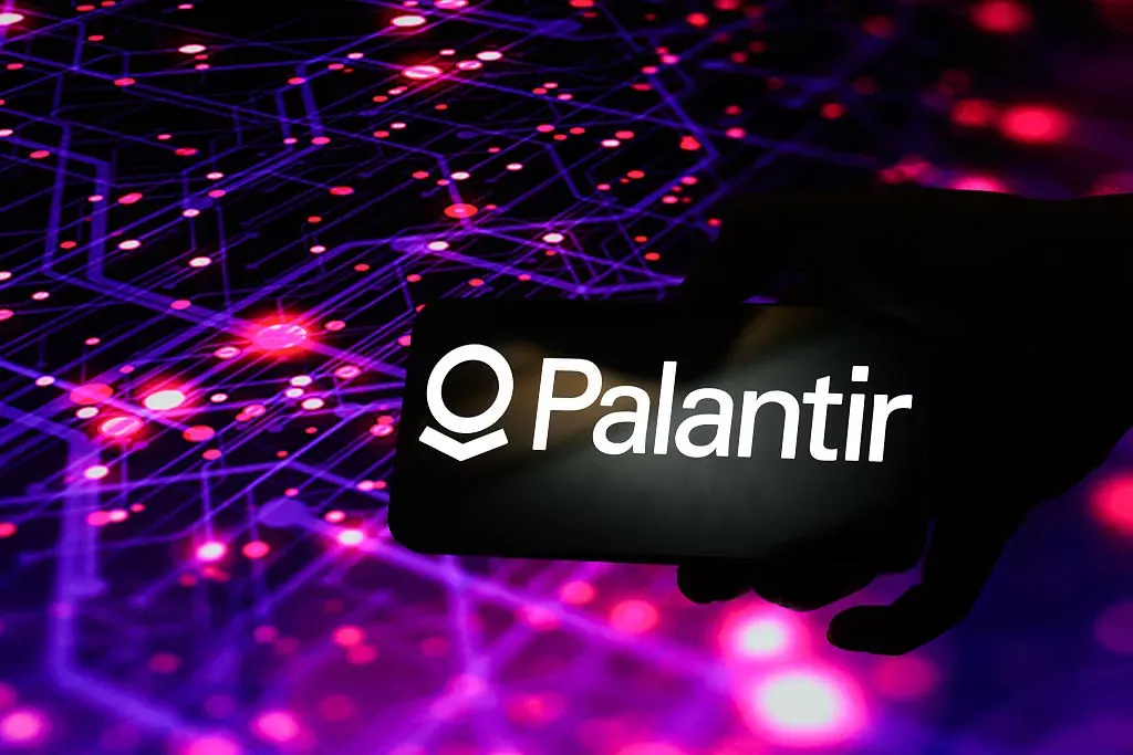 The Palantir Technologies logo is displayed on a mobile phone in this photo illustration in Brussels, Belgium, on August 6, 2025.