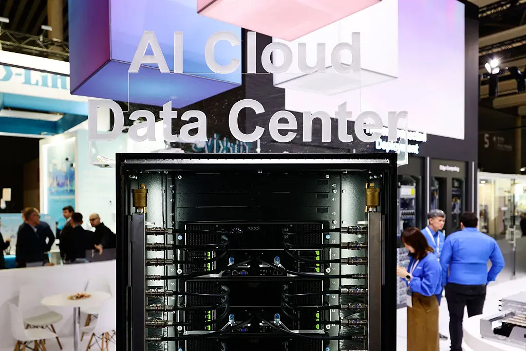 In Barcelona, Spain, on March 5, 2025, a close-up of AI cloud data center racks with servers, cables, and blinking lights.