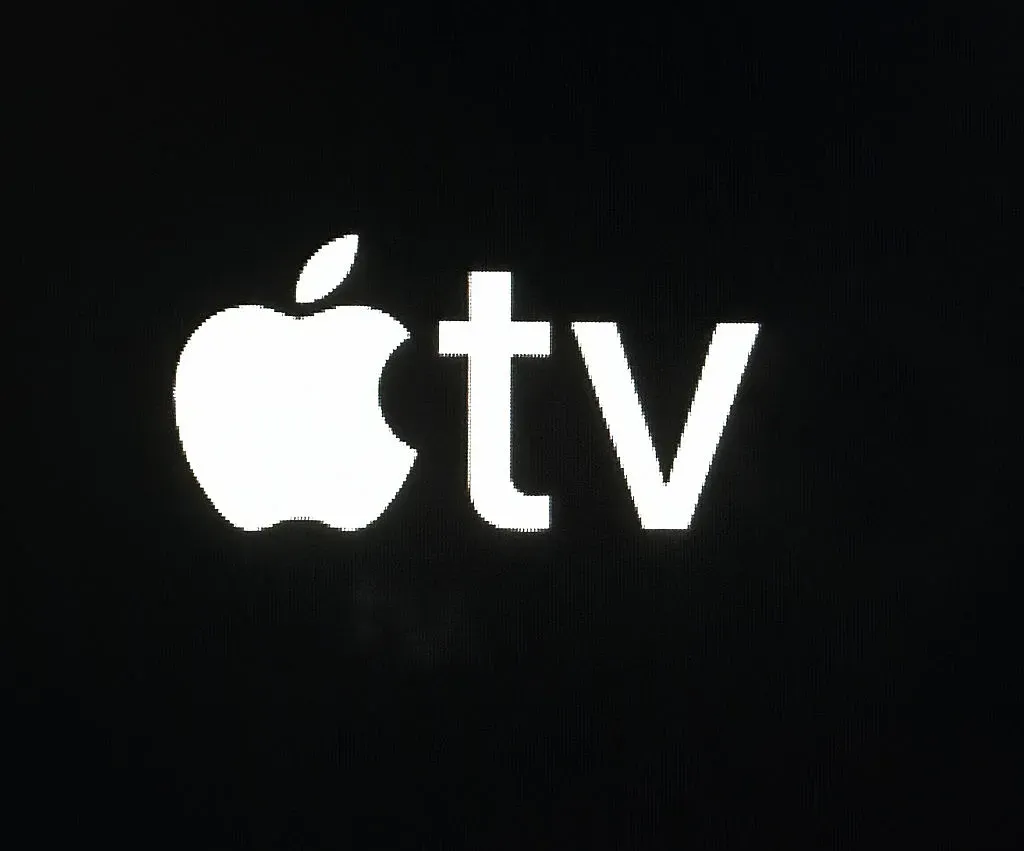  A photo illustration of an Online streaming service Apple TV logo.