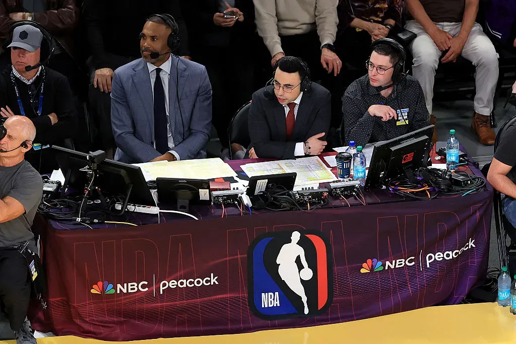 Grant Hill and Noah Eagle of NBC look on during the second quarter of the game between the Golden State Warriors and the Los Angeles Lakers.