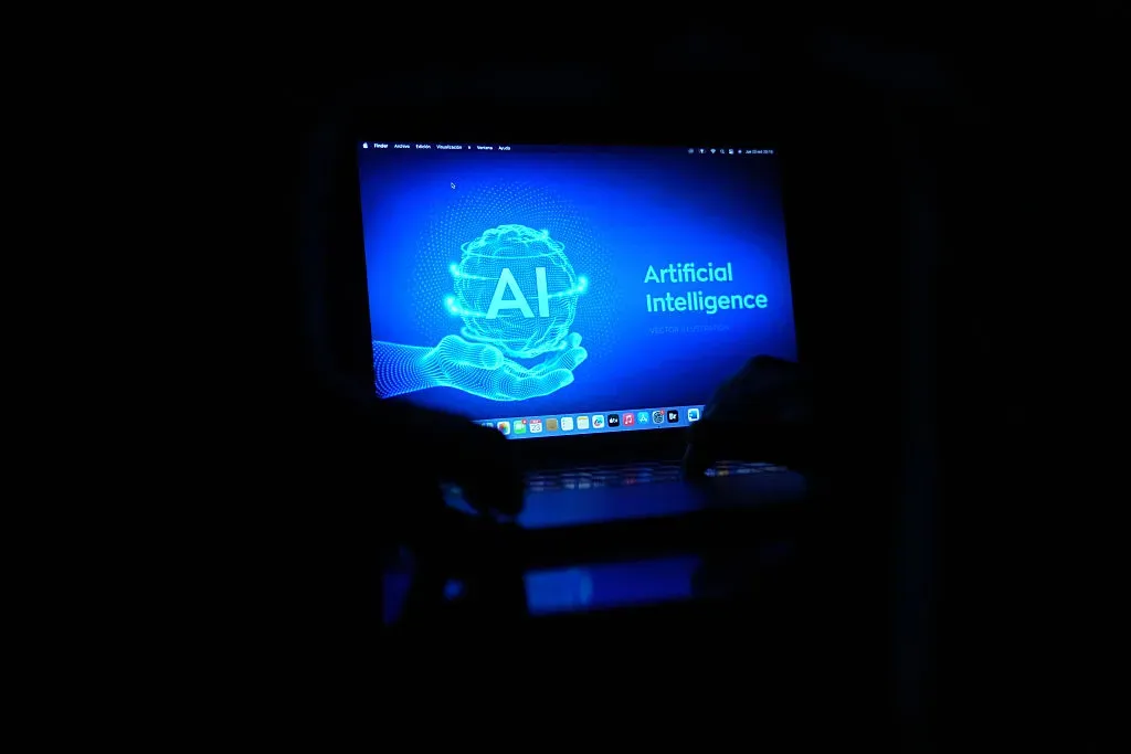A computer with the acronym AI for Artificial Intelligence.