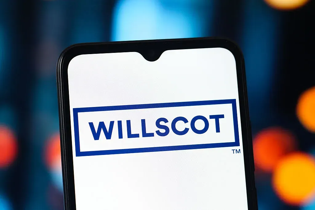 In this photo illustration, the WillScot Holdings Corporation (Will Scot) logo is seen displayed on a smartphone screen. 