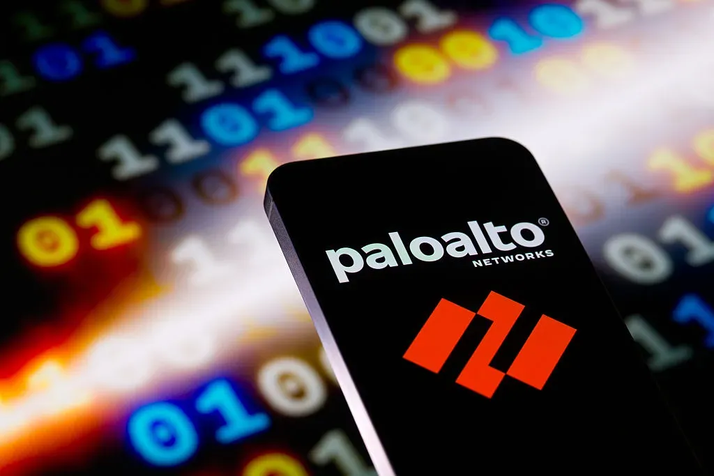 The Palo Alto Networks logo is displayed on a mobile phone with a visual digital background in this photo illustration in Brussels, Belgium, on November 26, 2025.
