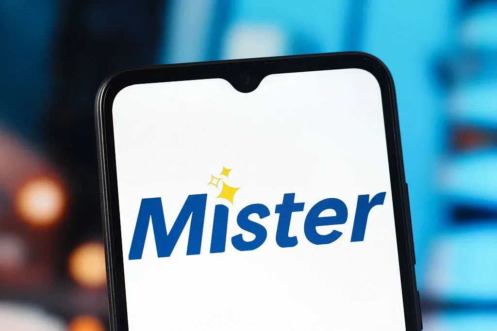 In this photo illustration, the Mister Car Wash (MCW) logo is seen displayed on a smartphone screen.