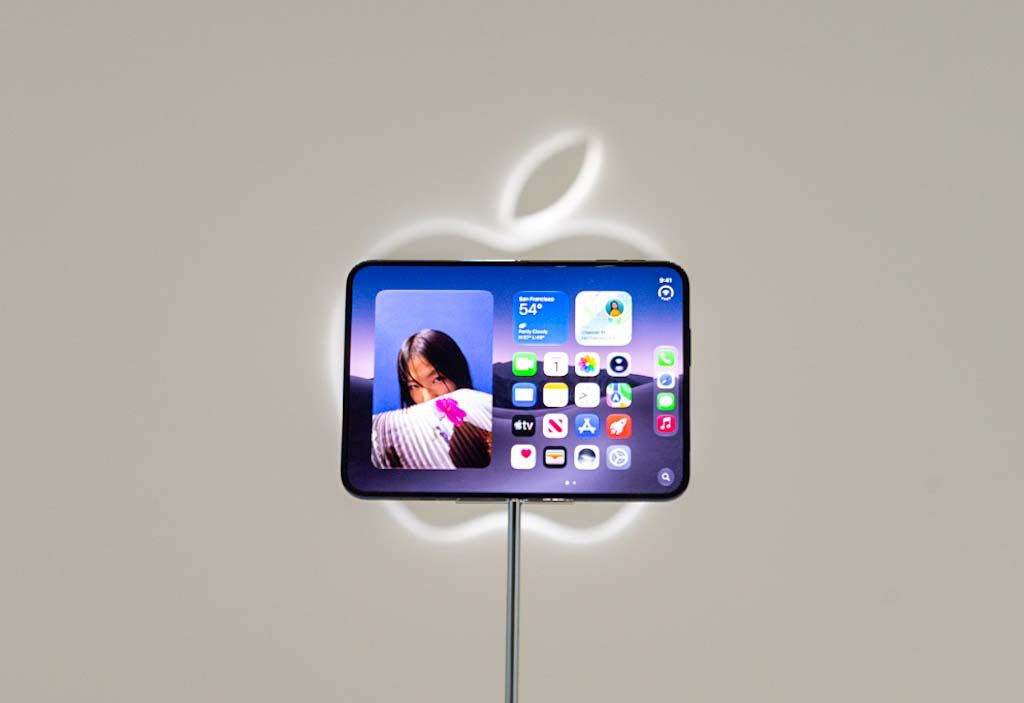 The iPhone Duo, Apple's first foldable smartphone, is on display at one of the company's product launch events.