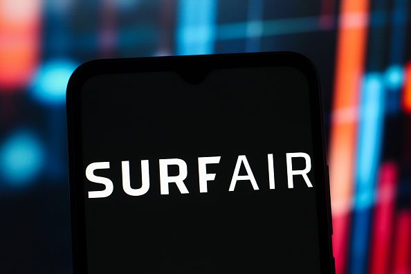In this photo illustration, the Surf Air Mobility logo is seen displayed on a smartphone screen. (Photo Illustration by Thomas Fuller/SOPA Images/LightRocket via Getty Images)