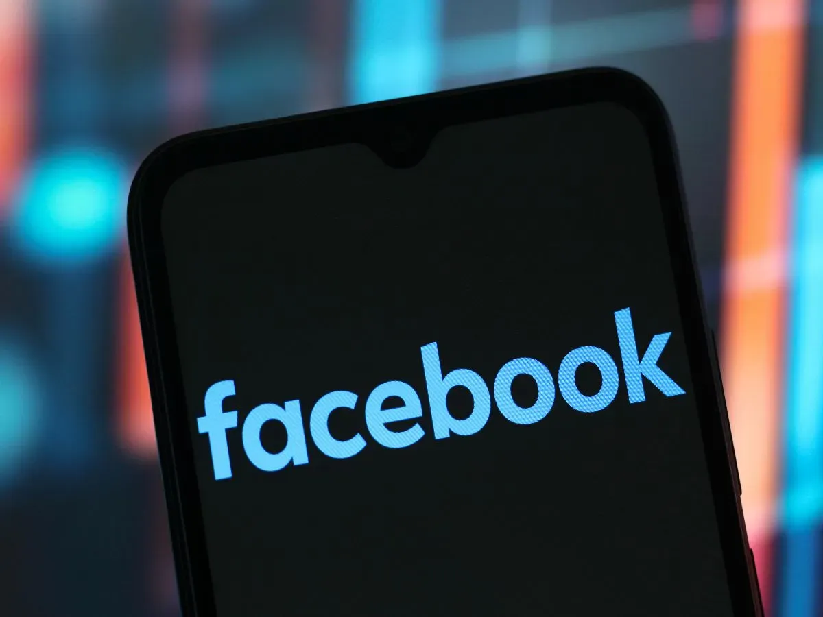 In this photo illustration, the Facebook logo is seen displayed on a smartphone screen. 