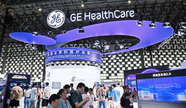 Visitors visit the medical services at the booth of General Electric of the United States during the 2023 World Artificial Intelligence Conference in Shanghai, China, July 8, 2023. (Photo credit should read CFOTO/Future Publishing via Getty Images)