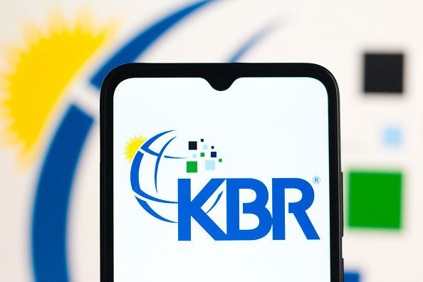 In this photo illustration, the KBR, Inc. logo is seen displayed on a smartphone screen. (Photo Illustration by Thomas Fuller/SOPA Images/LightRocket via Getty Images)