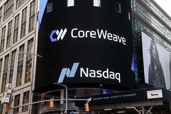 CoreWeave Inc. signage at the Nasdaq MarketSite in New York, US. Photographer: Michael Nagle/Bloomberg via Getty Images