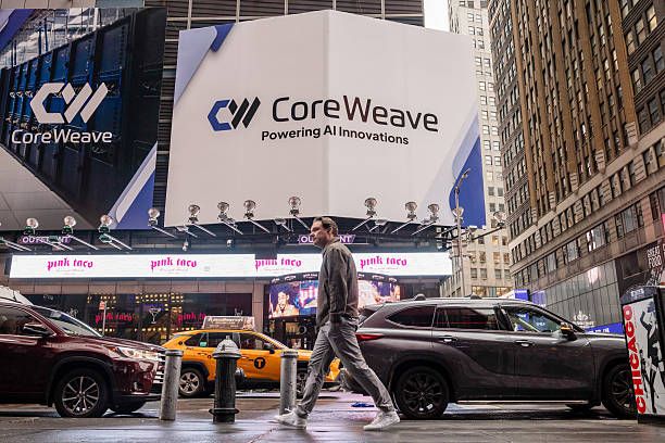 CoreWeave Inc. signage in Times Square in New York, US, on Friday, May 9, 2025. (Photo by Yuki Iwamura/Bloomberg via Getty Images)