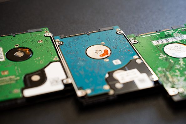 Three 2.5-inch hard disk drives are seen in this illustration photo in Athens, Greece, on February 20, 2026. (Photo by Nikos Pekiaridis/NurPhoto via Getty Images)