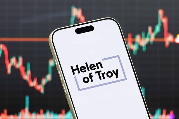 Helen of Troy Logo Shown on Smartphone with Latest Stock Market Chart