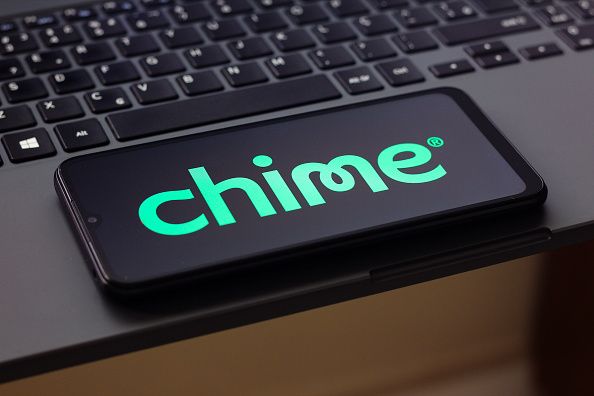 In this photo illustration, the Chime Financial logo is seen displayed on a smartphone screen. (Photo Illustration by Thomas Fuller/SOPA Images/LightRocket via Getty Images)