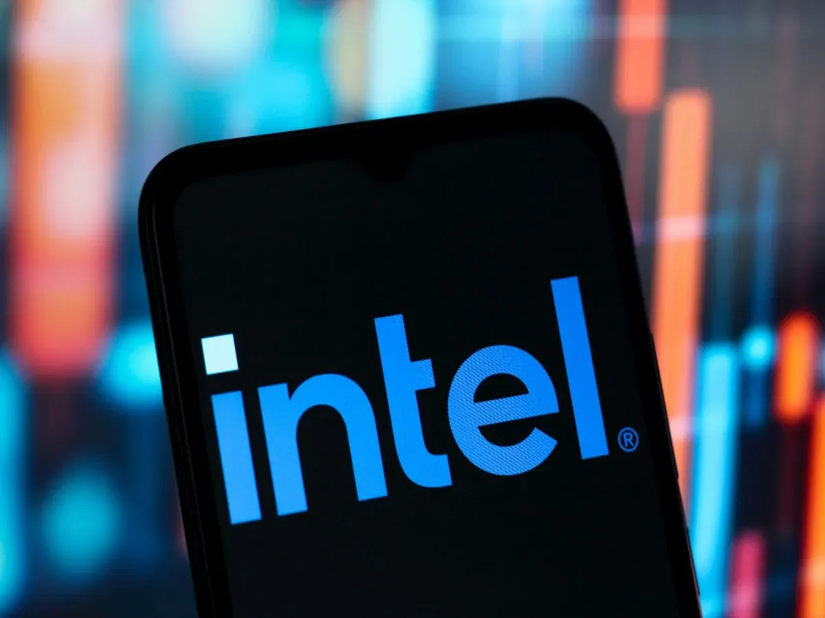In this photo illustration, the Intel Corporation logo is seen displayed on a smartphone screen. 
