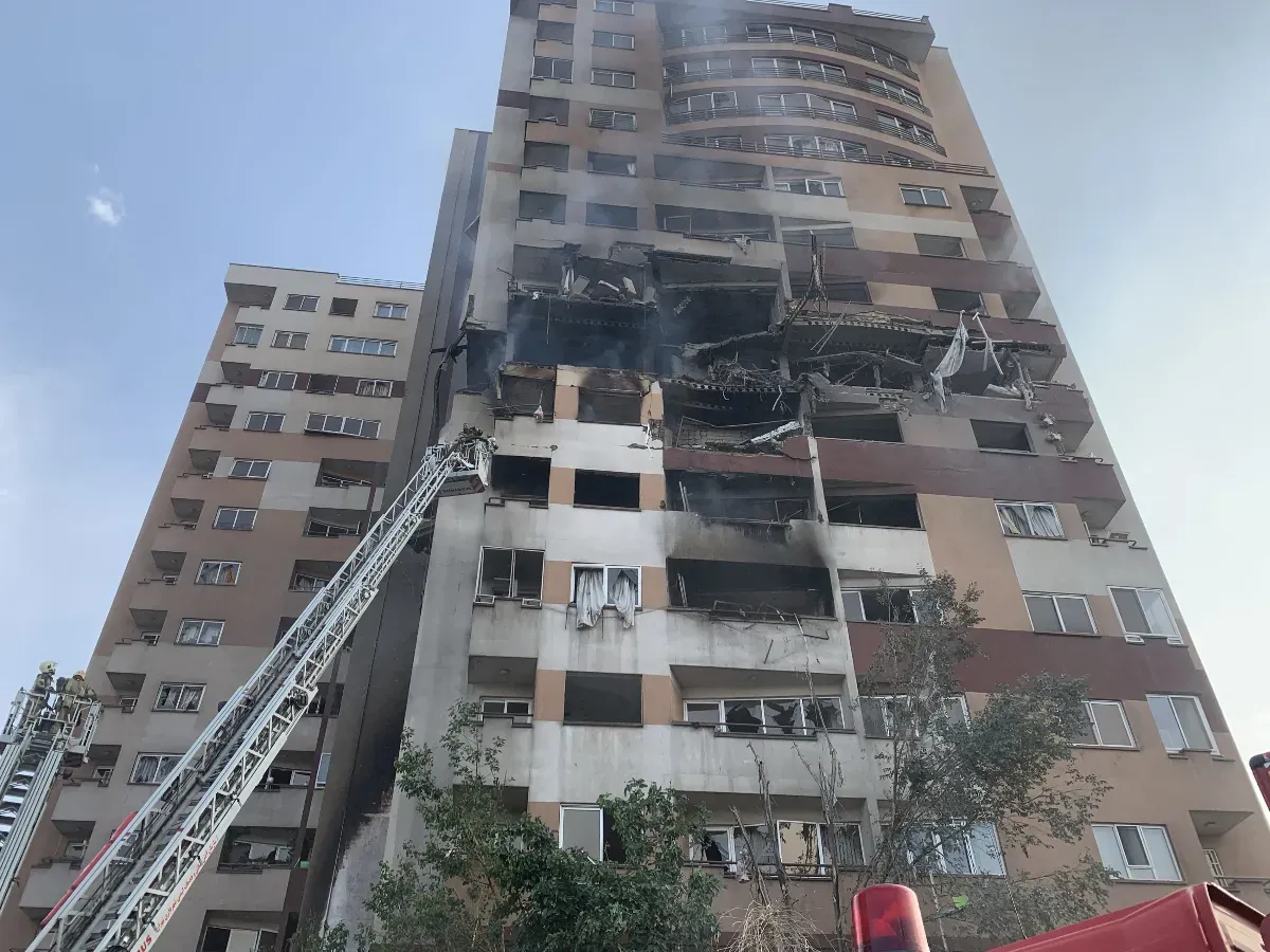 A view of a damaged building in the Iranian capital, Tehran, following an attack, on June 13, 2025. Firefighting teams are dispatched to the area. (Photo by Fatemeh Bahrami/Anadolu via Getty Images)