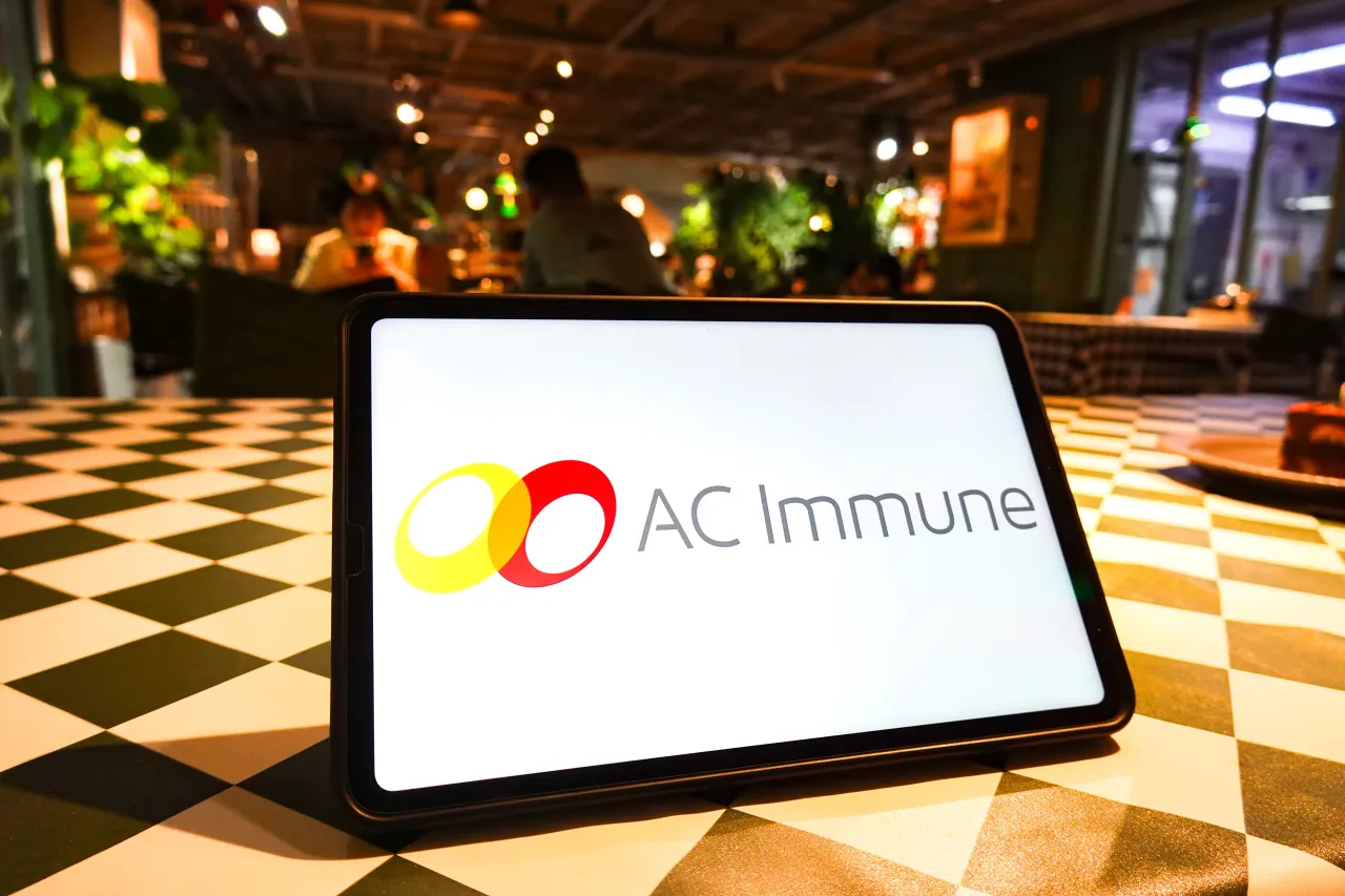 CHINA - 2025/10/02: In this photo illustration, the AC Immune logo is displayed on the screen of a tablet. (Photo Illustration by Sheldon Cooper/SOPA Images/LightRocket via Getty Images)