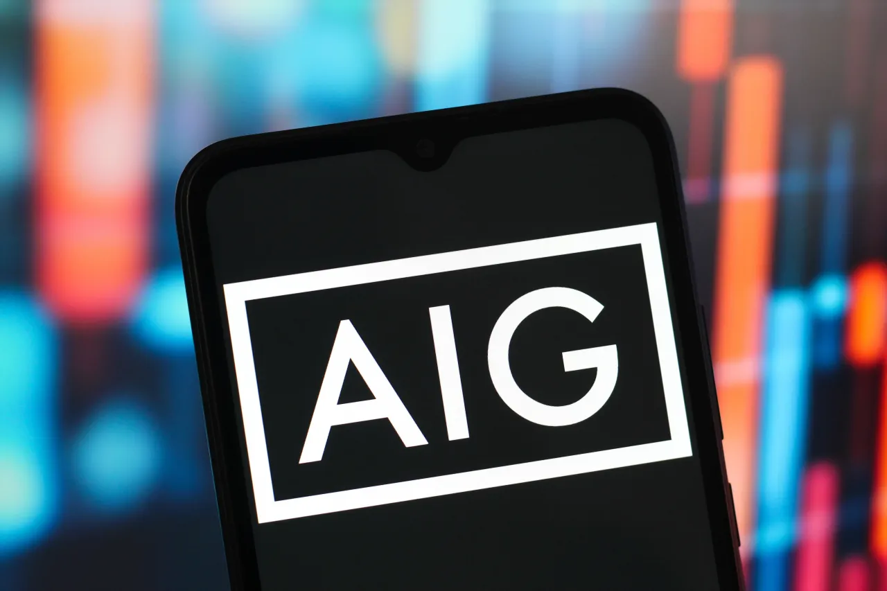The AIG (American International Group) logo is seen displayed on a smartphone screen. (Photo Illustration by Thomas Fuller/SOPA Images/LightRocket via Getty Images)