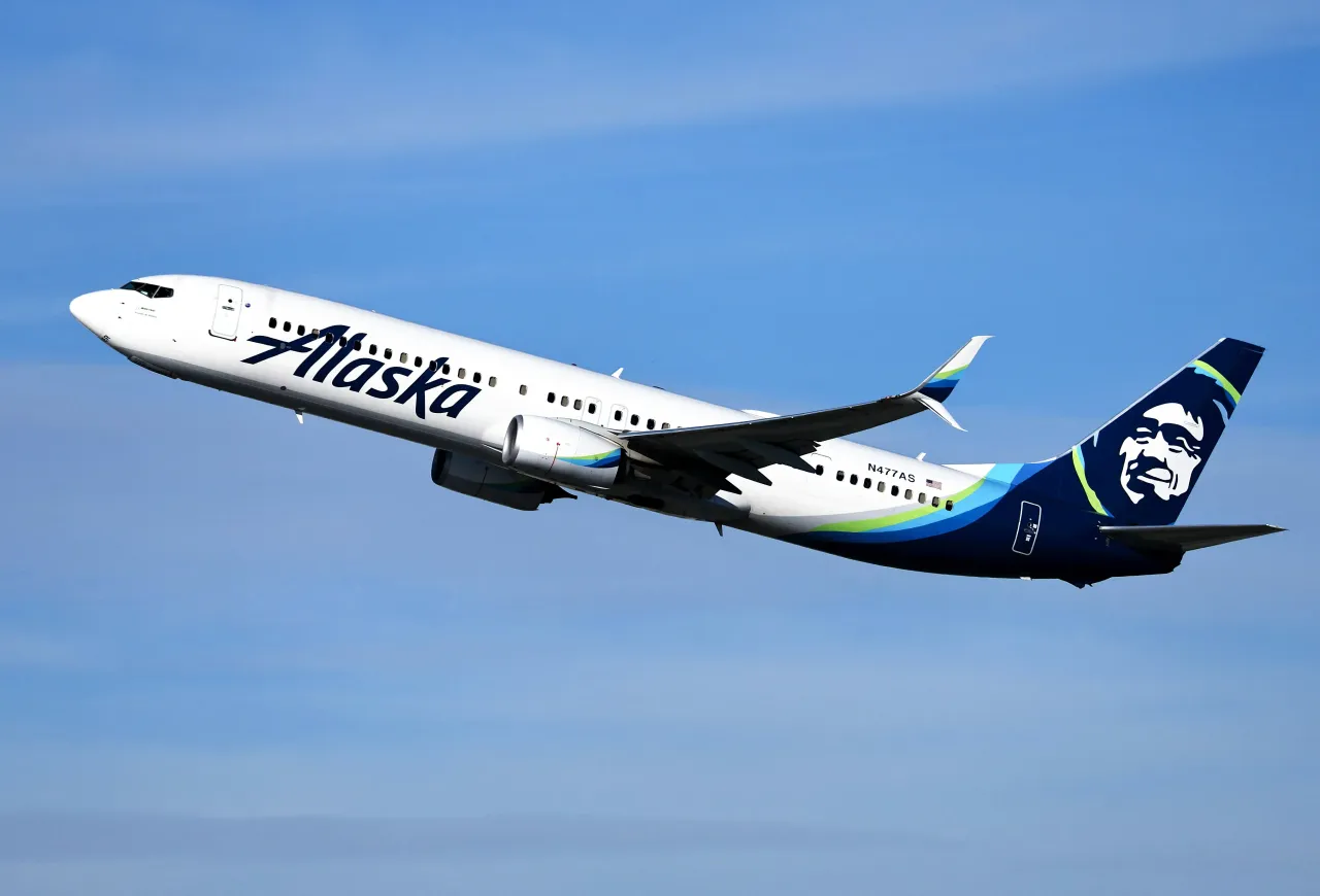 An Alaska Airlines plane takes off from Los Angeles International Airport (LAX) on December 4, 2023 in Los Angeles, California. 