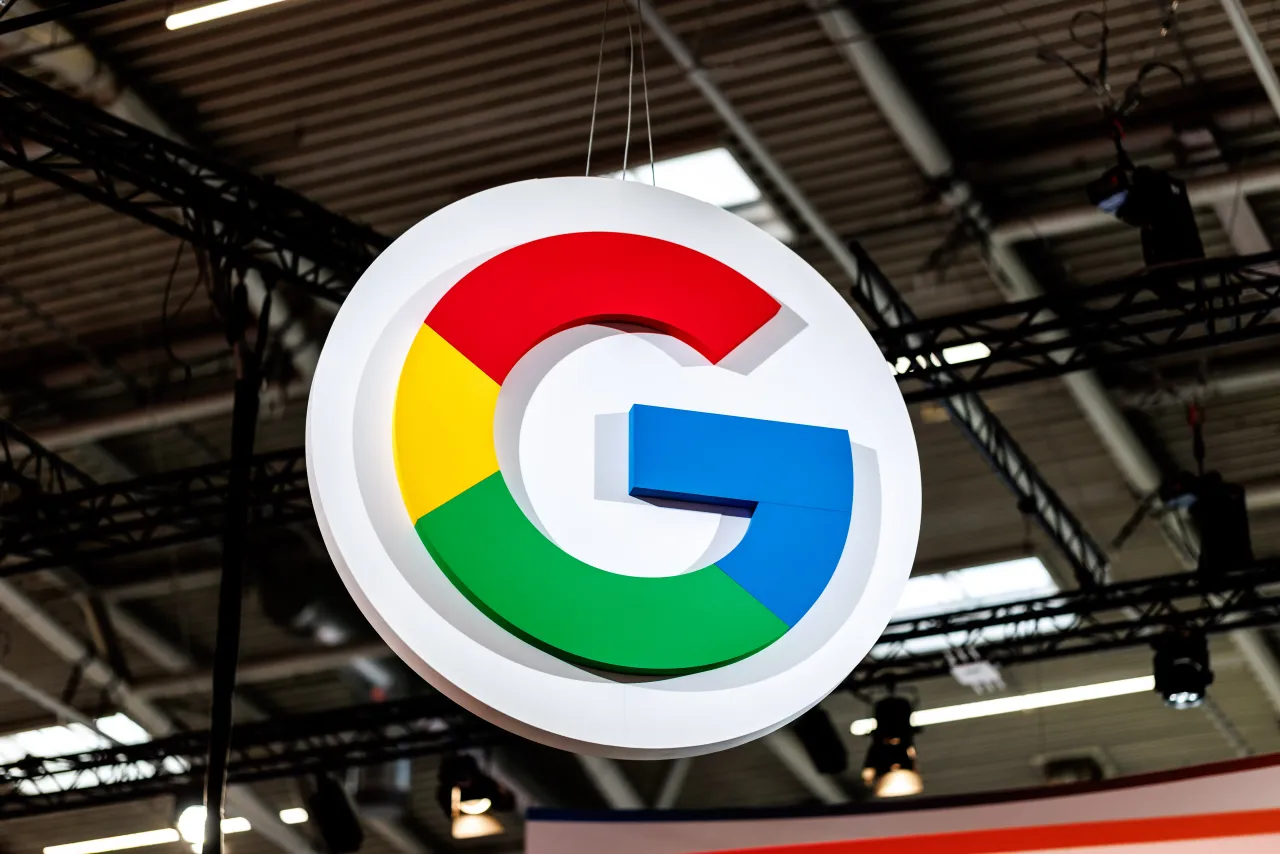 The Google brand logo (logo, symbol, emblem) can be seen at the company's stand at the IAA Mobility (International Motor Show) in a hall at Messe München (Bavaria, Germany) on September 12, 2025.