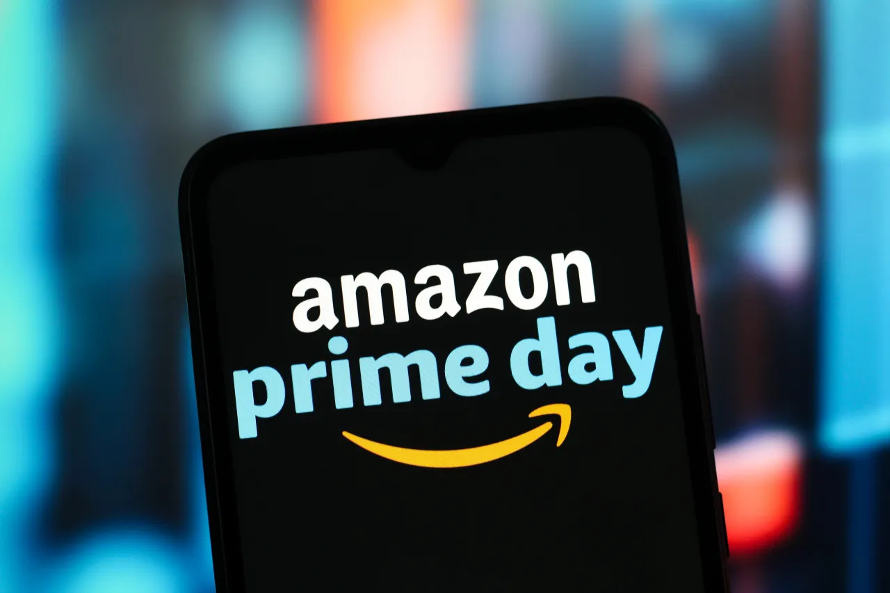 In this photo illustration, the Amazon Prime Day logo is seen displayed on a smartphone screen. 
