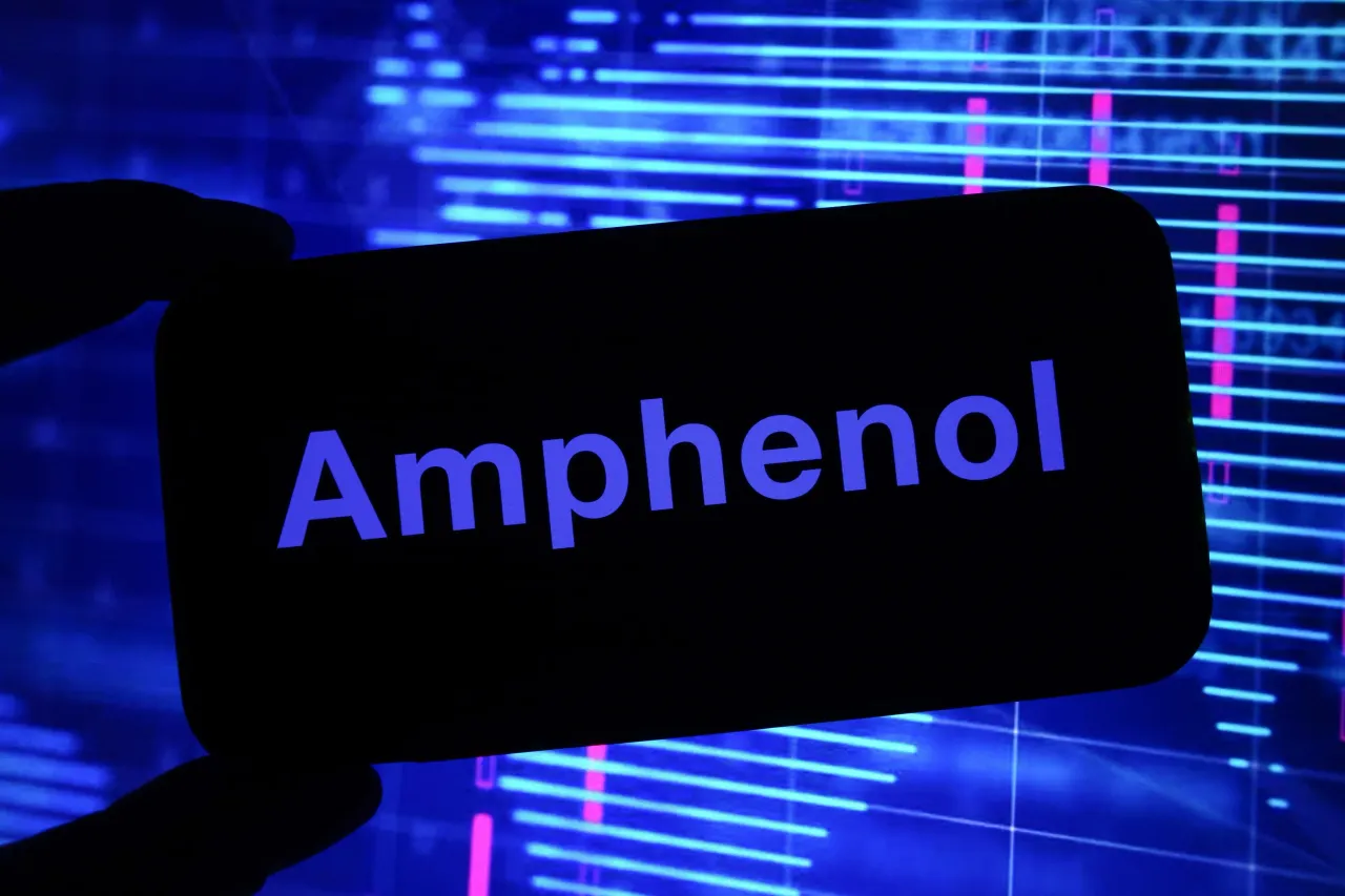  In this photo illustration, the Amphenol company logo is seen displayed on a smartphone screen. 
