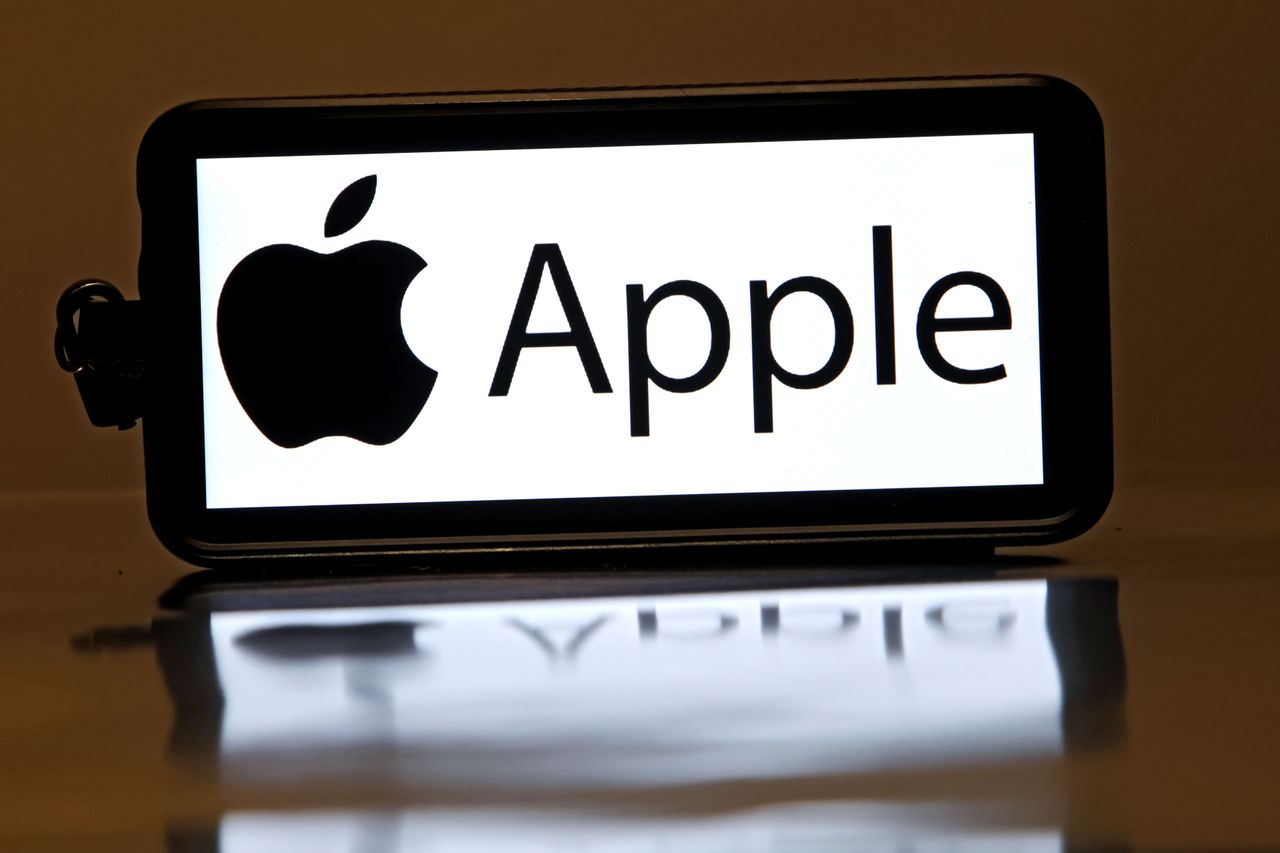 Apple Inc logo is seen displayed on the screen of a smartphone. (Photo by Mike Campbell/NurPhoto via Getty Images)