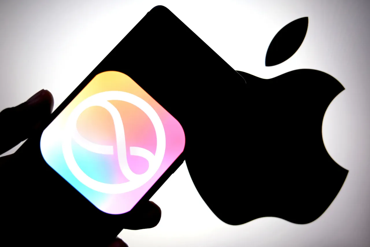 In this photo illustration, an Apple Siri logo is seen displayed on a smartphone with an Apple logo in the background. 