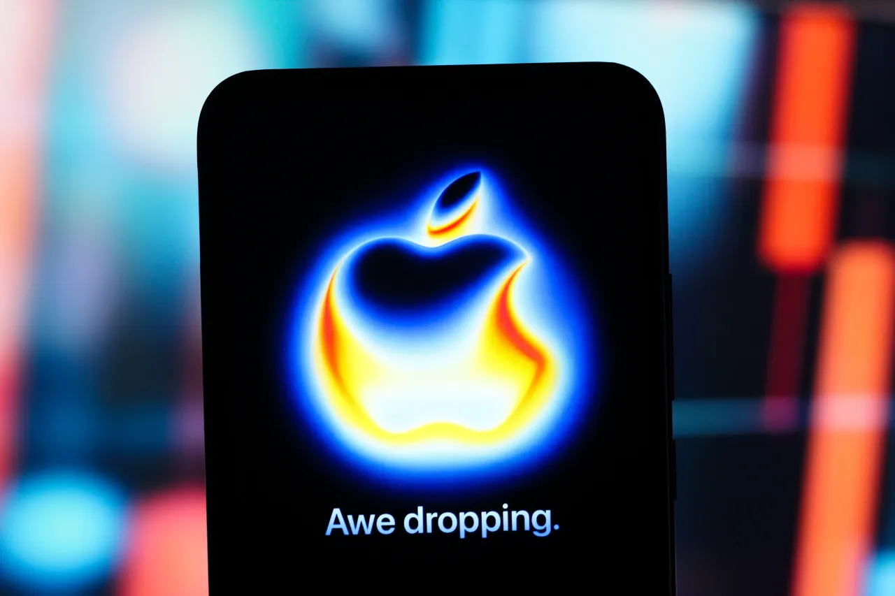 In this photo illustration, the Apple logo "Awe Dropping", where the iPhone 17 will be presented is seen displayed on a smartphone screen. 