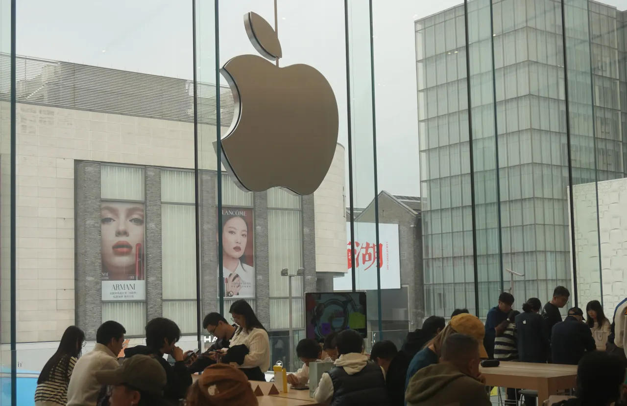 Customers purchase iPhone 17 series phones at the Apple flagship store in Hangzhou, Zhejiang Province, China on October 30, 2025.