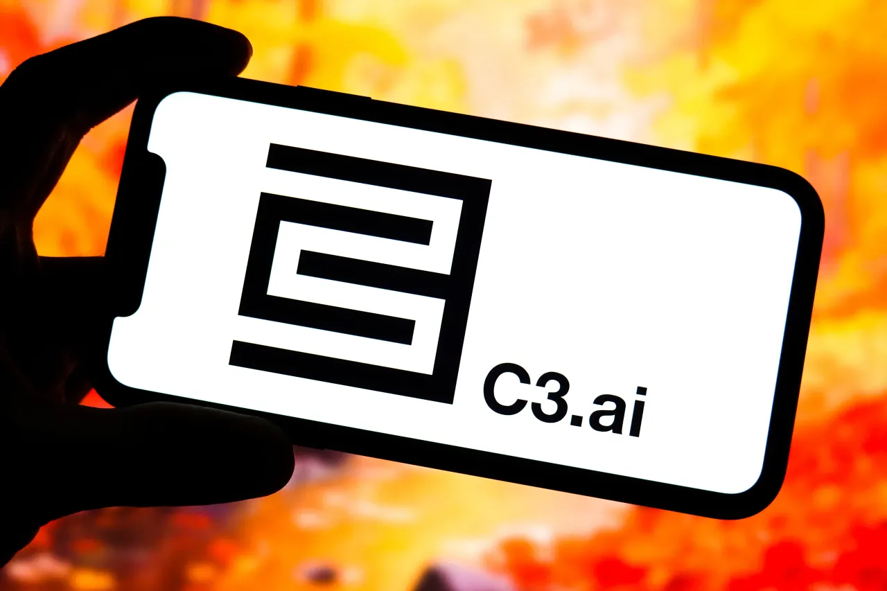In this photo illustration, a C3.ai logo is displayed on the screen of a smartphone. 
