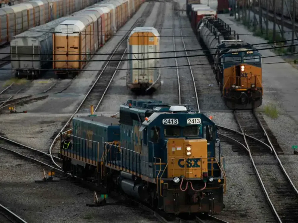  CSX Transportation Inc. freight trains sit parked in a railroad yard in Kentucky.