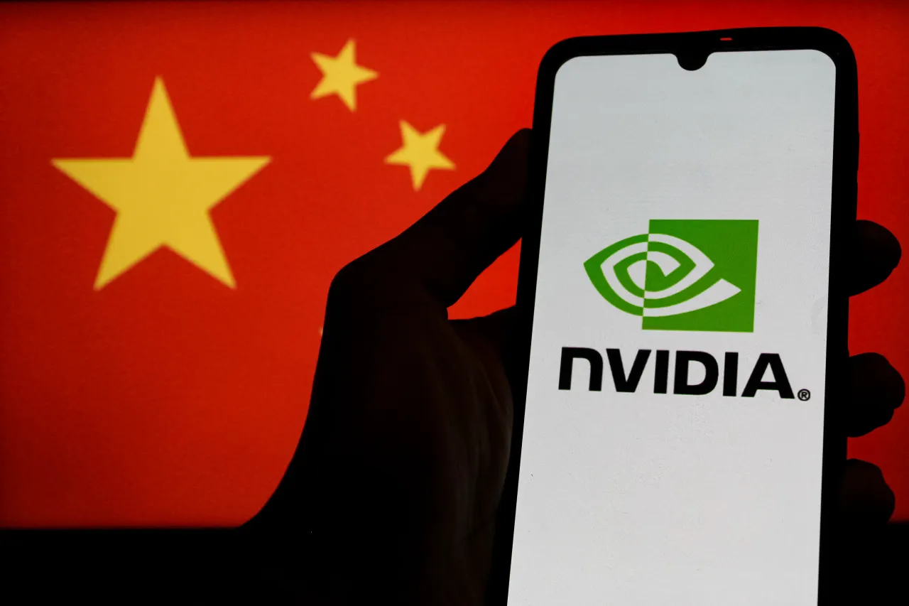 In this photo illustration the Nvidia logo is shown on mobilephone screens against a computer screen displaying a Flag Of China, as the company develops its AI systems. 
