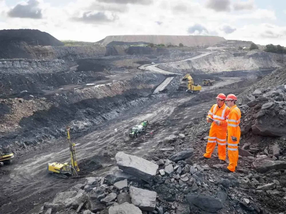 Workers Looking Over Coal Mine.
