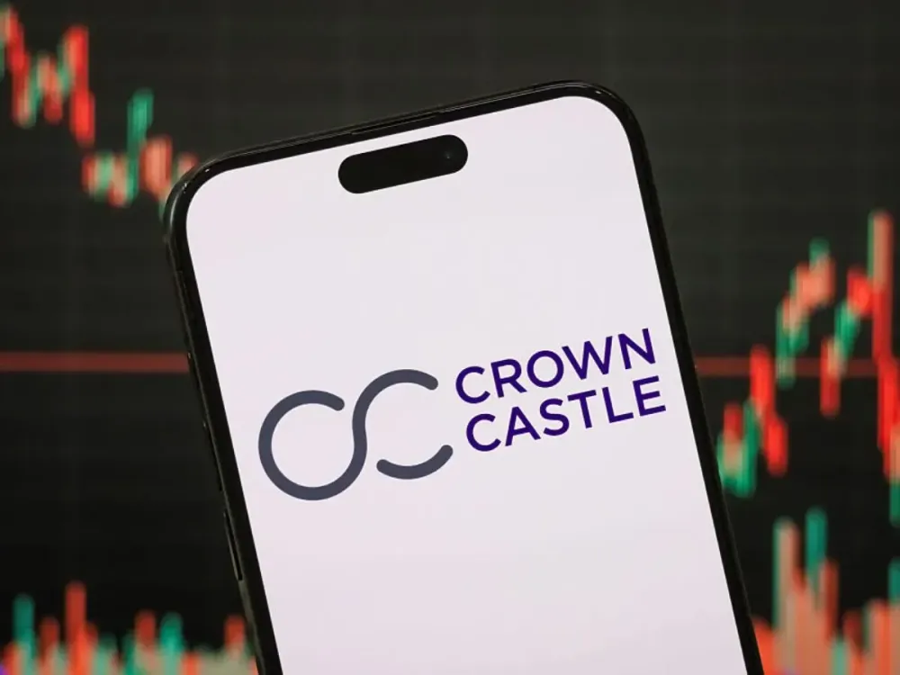 In this photo illustration, the logo of Crown Castle Inc. is displayed on a smartphone screen.